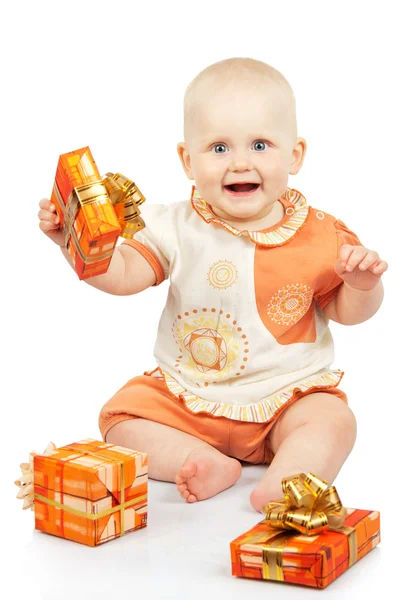 Baby with gifts isolated on white — Stock Photo, Image