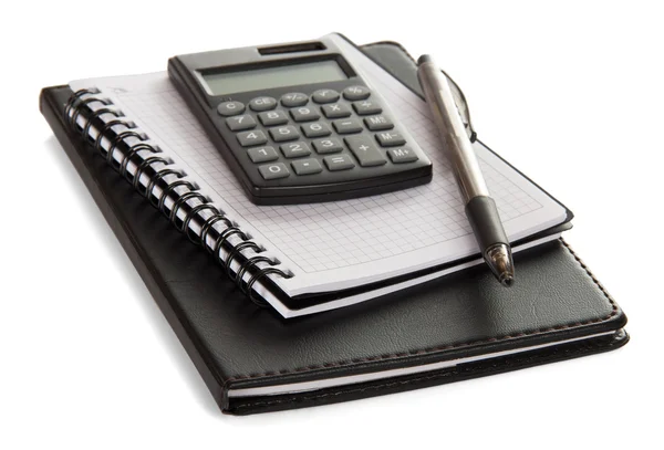 Bloc de notas, hojas vacías para notas la calculadora y el mango aislado en blanco — Foto de Stock