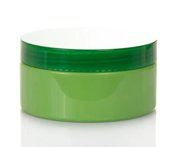 Creme de cosméticos no frasco verde, isolado em branco — Fotografia de Stock