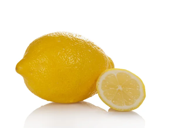 The whole lemon and the slice of a lemon isolated on white — Stock Photo, Image