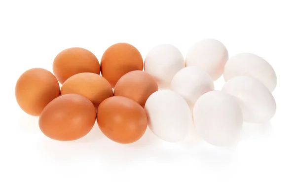 The white and brown eggs isolated on white — Stock Photo, Image