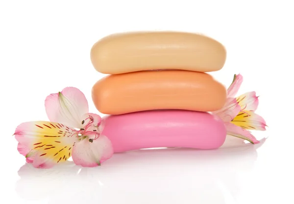 Set of new pieces of soap and the flower, isolated on white — Stock Photo, Image