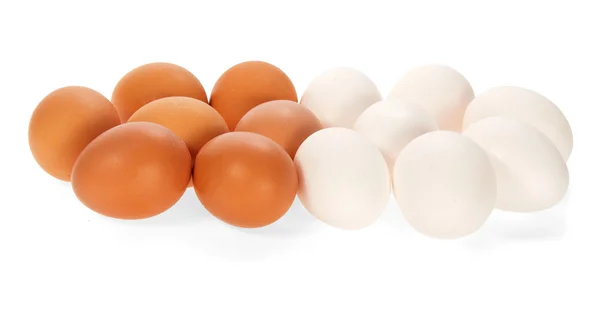 The white and brown eggs isolated on white — Stock Photo, Image