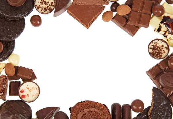 Skład czekolady słodycze zbliżenie, na białym tle — Zdjęcie stockowe