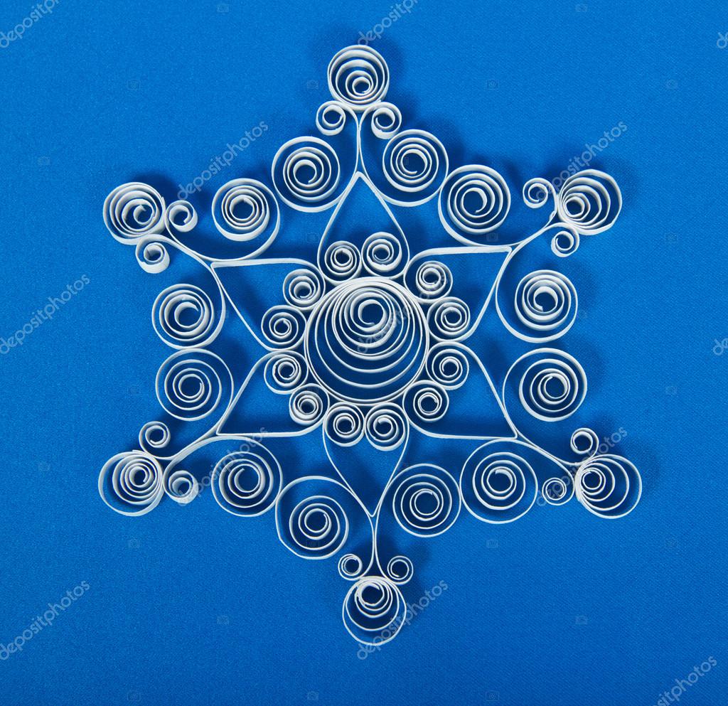 Immagini Quilling Natale.Quilling Made Of Strips Of Paper Christmas Snowflake On Blue Background Stock Photo C Laboko 32300101