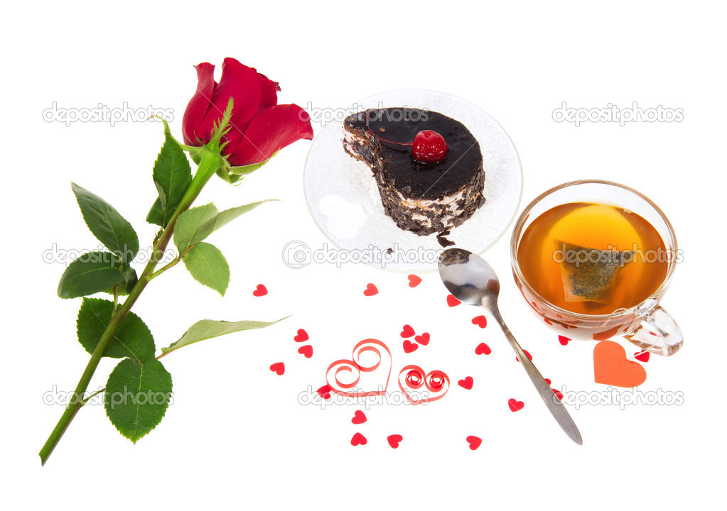 Chocolate cake, hot tea and red rose isolated on white
