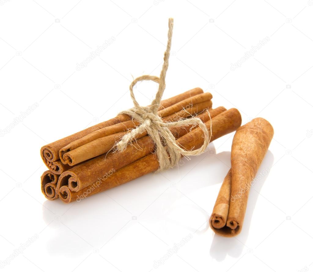 The fragrant sticks of cinnamon isolated on white
