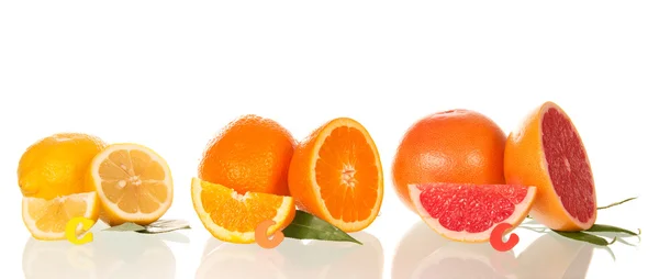Lemon, orange and grapefruit in a section — Stock Photo, Image