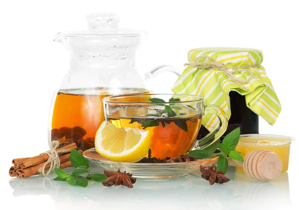 Cup of tea with mint and a lemon — Stock Photo, Image