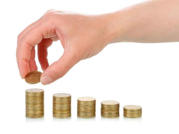 Hand with coins stacks — Stock Photo, Image