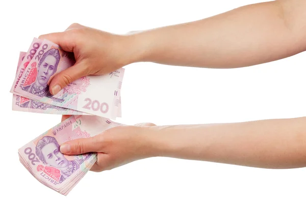 Ukrainian money in hands — Stock Photo, Image
