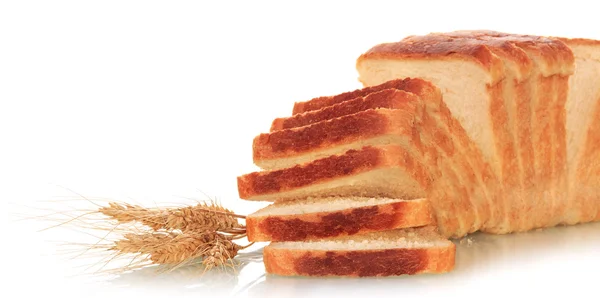 Sliced bread and ears of wheat — Stock Photo, Image