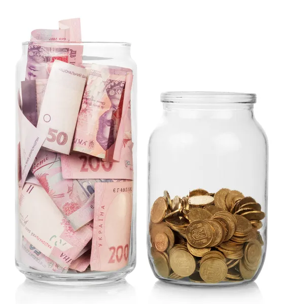 Money in glass jars — Stock Photo, Image