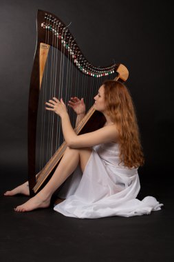 Girl with harp clipart
