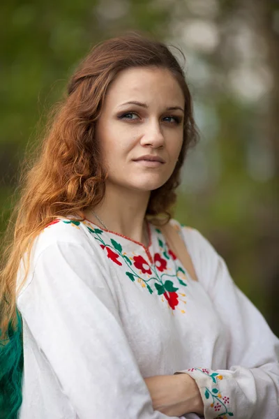 Beautiful girl in the national costume — Stock Photo, Image