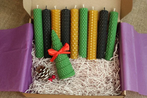 Handmade bee wax candles natural colour in the box. Bee candles good present for Christmas.