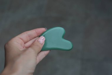  Yeşil guasha kazıyıcı cilt bakımı için iyidir yaşlanmayı önler..