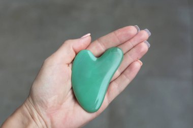  Yeşil guasha kazıyıcı cilt bakımı için iyidir yaşlanmayı önler..