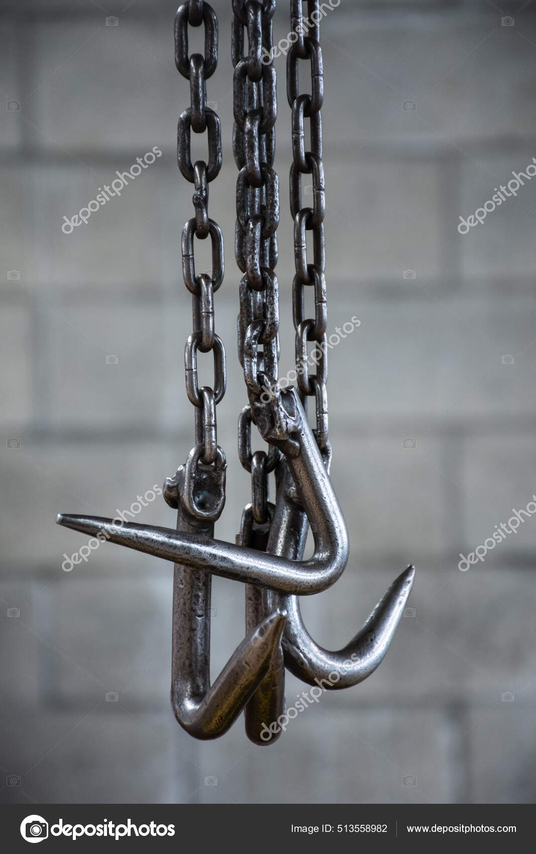 Vertical Shot Metal Hooks Hanging Chains Gray Brick Wall Background Stock  Photo by ©Wirestock 513558982
