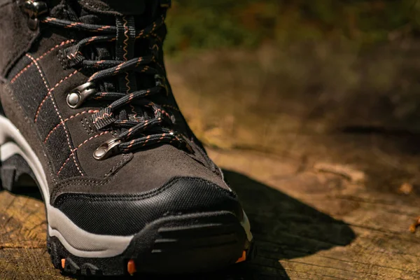 Closeup Shot Dark Grey Hiking Boot Wooden Surface — Stock Photo, Image