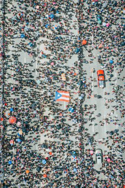 SAN JUAN, PUERTO RICO - Jul 23, 2019: The Demonstrators Demanding Governor Ricardo Rosello Resignation in Puerto Rico clipart