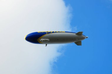 FRANKFURT, GERMANY - Sep 24, 2021: An airship on a sightseeing flight over Frankfurt. The Zeppelin NT - New Technology - is developed and based in Friedrichshafen on Lake Constance. clipart