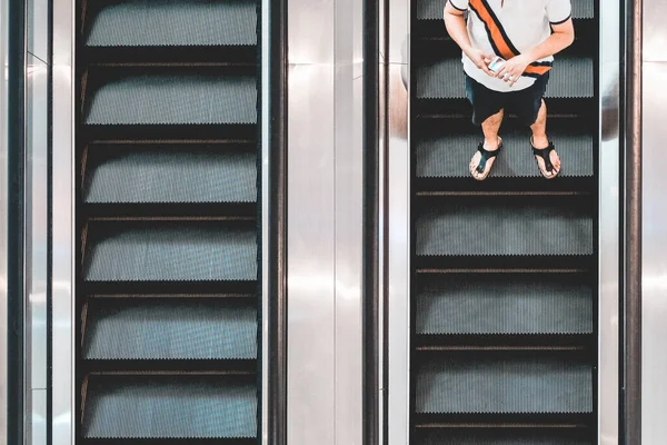 Top View Shot Man Smartphone Escalator Going — Stock Photo, Image