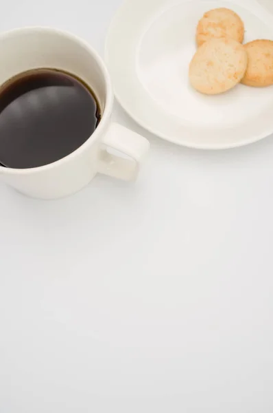 Black Coffee Mug Plate Biscuits White Background Copy Space — Stock Photo, Image