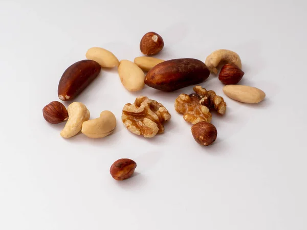 Foto Close Dari Berbagai Jenis Kacang Pada Permukaan Putih — Stok Foto