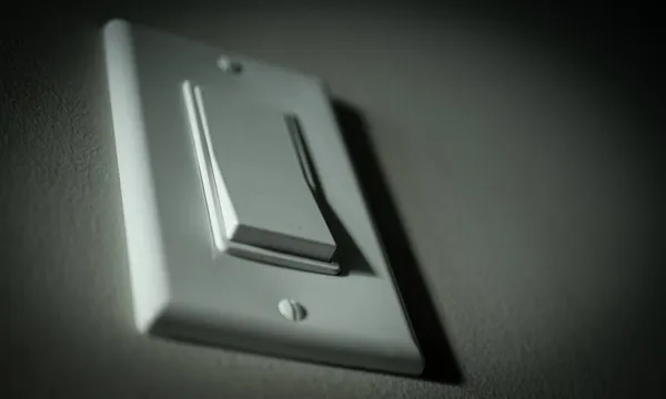 Nahaufnahme Eines Lichtschalters Gegen Eine Wand — Stockfoto