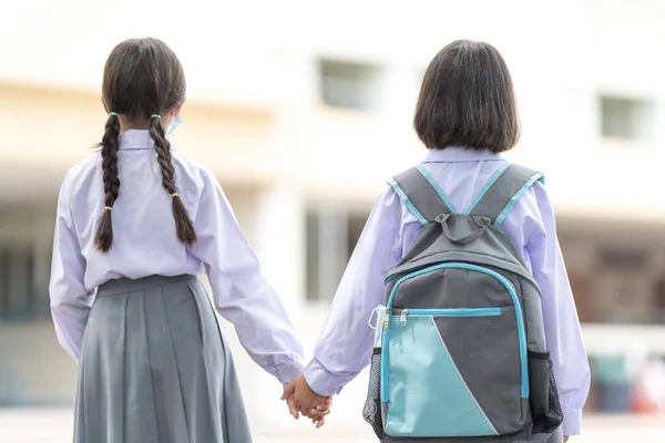 Shallow Focus Two Adorable Kids School Uniforms Holding Hands Walking — Stock Photo, Image