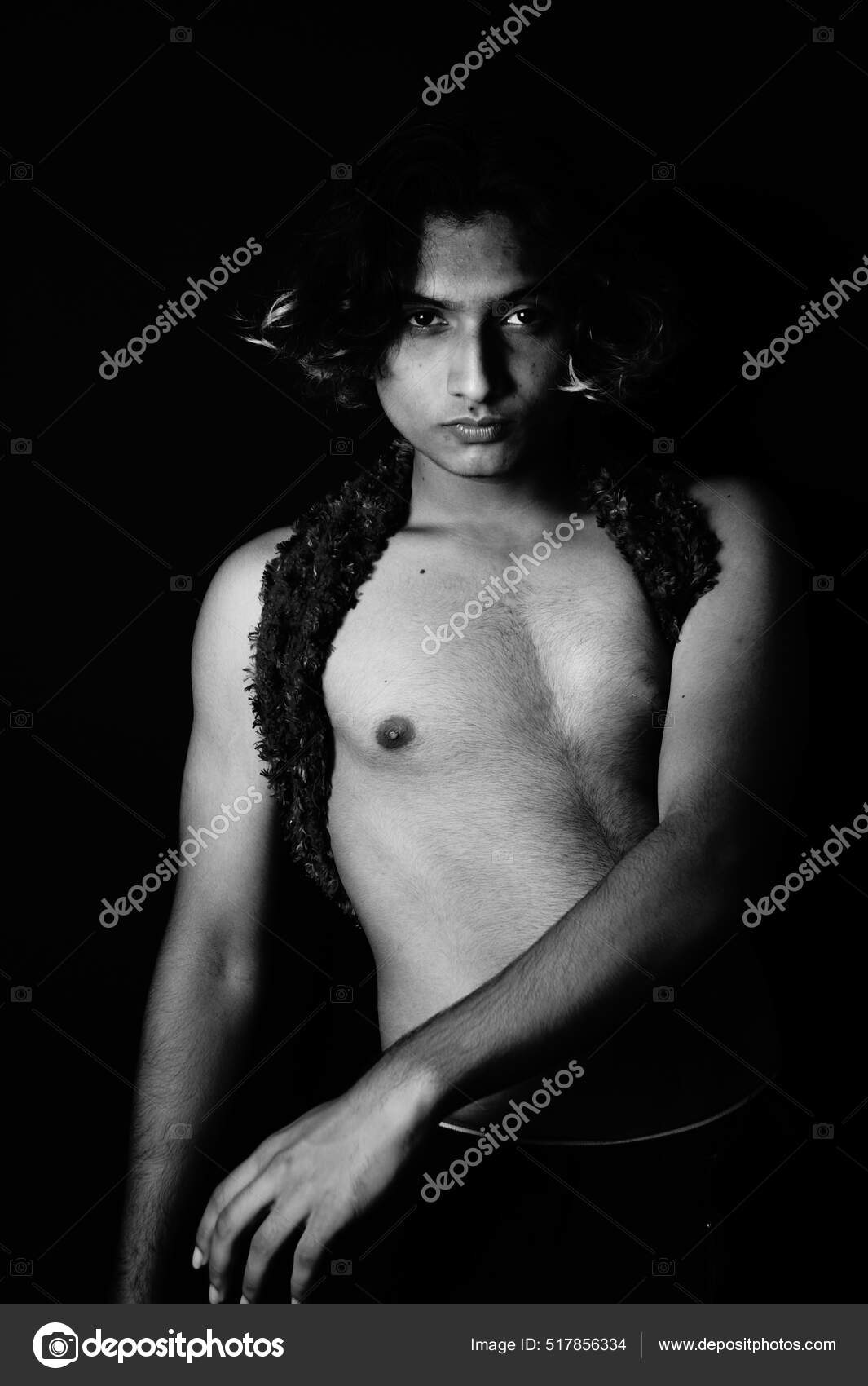 Greyscale Shot Half Naked South Asian Male Feather Scarf Wig Stock Photo by  ©Wirestock 517856334