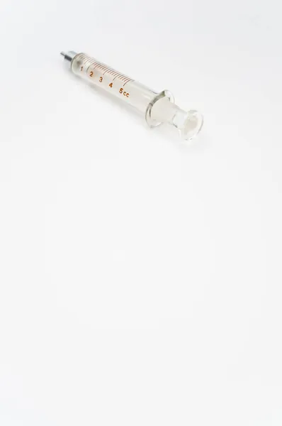Eine Isolierte Injektionsspritze Auf Weißem Papierhintergrund Mit Textfläche — Stockfoto