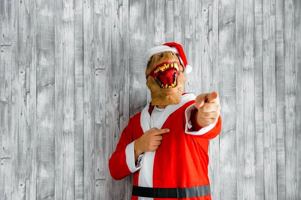 Shot Dinosaur Dressed Person Santa Claus Pointing His Finger Camera — Stock Photo, Image