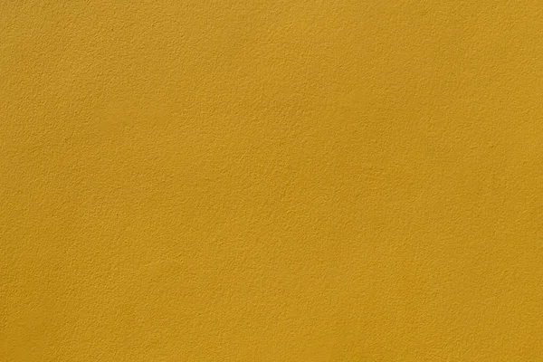 Uma Parede Cimento Amarelo Com Uma Superfície Áspera Para Imagens — Fotografia de Stock