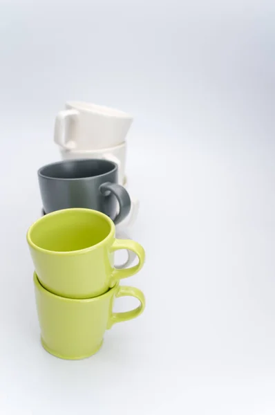 Set Multicolored Ceramic Cups White Tabletop Copy Space — Stock Photo, Image