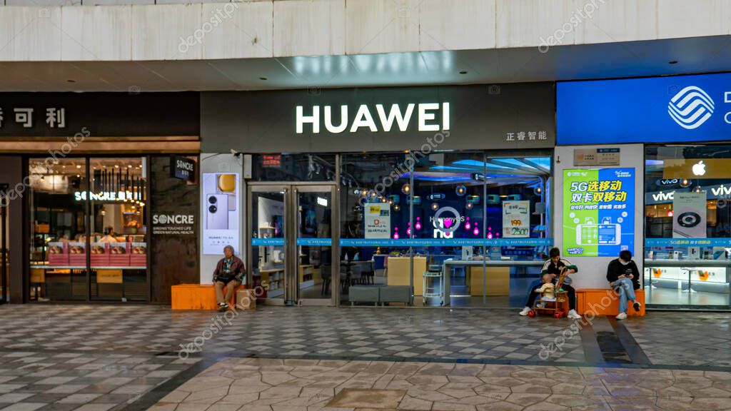 ZHENGZHOU, CHINA - Sep 28, 2021: The HUAWEI front store with logo and signage, Chinese style shop in the Mall in Zhengzhou, China