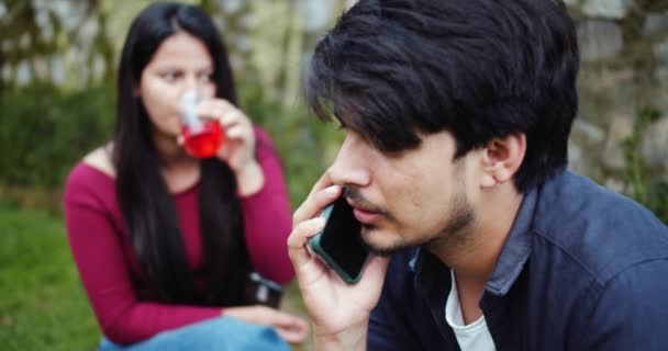 Group Friends Having Picnic Man Talking Phone Woman Drinking Wine — Stockvideo