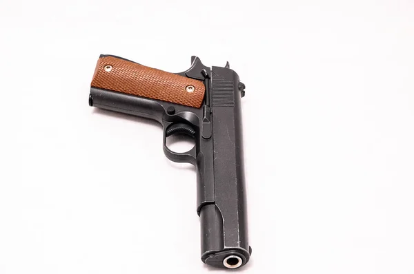 High Angle Closeup Gun White Background — Stock Photo, Image