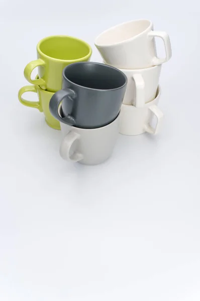 Set Multicolored Ceramic Cups White Tabletop Copy Space — Stock Photo, Image