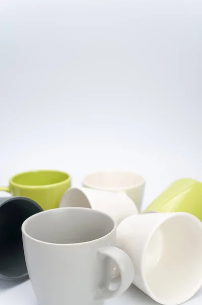 Set Multicolored Ceramic Cups White Tabletop Copy Space — Stock Photo, Image