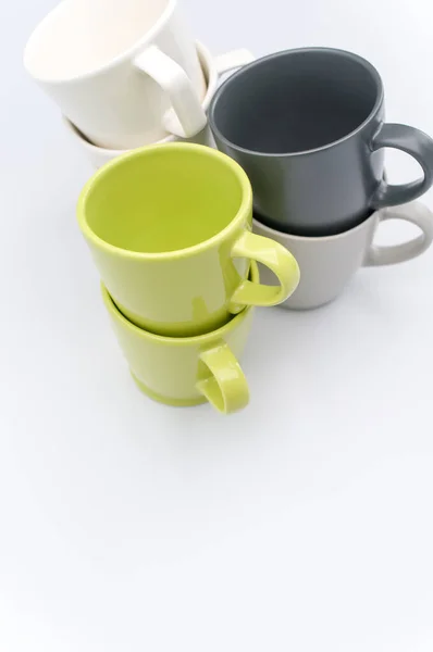 Set Multicolored Ceramic Cups White Tabletop Copy Space — Stock Photo, Image