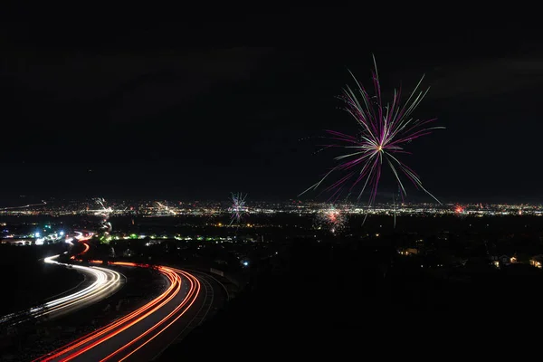 Night View Road Bright Traffic Lights Trails Fireworks Sky July — Stock Photo, Image