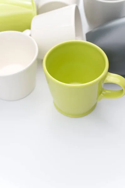 Set Multicolored Ceramic Cups White Tabletop Copy Space — Stock Photo, Image