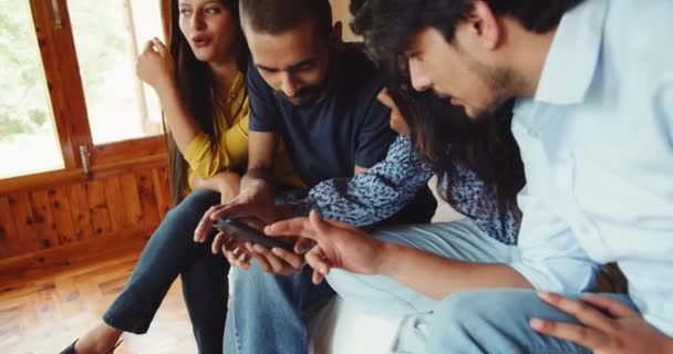 Group Friends Sitting Together Home Using Smartphone — Vídeo de stock