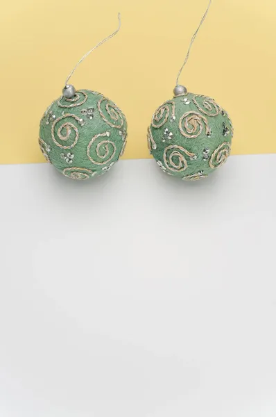Green Christmas Decorative Balls Sapce Text White Yellow Paper Surface — Stock Photo, Image