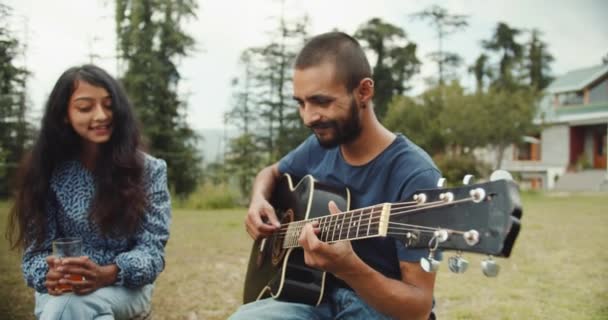Group Friends Enjoying Picnic Park Man Playing Guitar — Video