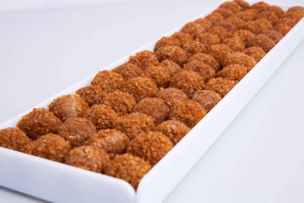 Closeup Shot Sweet Crispy Balls Long White Plate — Stock Photo, Image