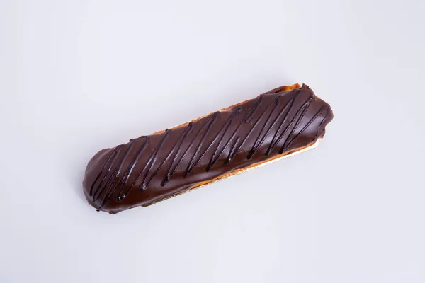 Tetején Kilátás Egy Finom Csokoládé Eklair Fehér Háttér — Stock Fotó