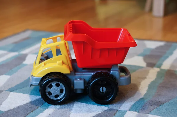 Caminhão Brinquedo Colorido Tapete — Fotografia de Stock